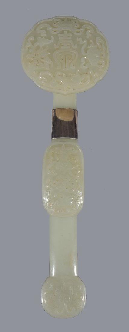 A Chinese celadon jade ruyi sceptre (1 of 4)