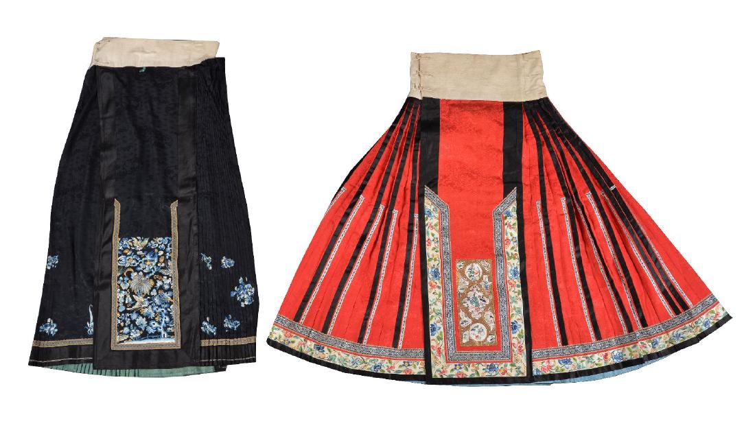 A Chinese Han lady's red silk damask pleated skirt: A Chinese Han lady's red silk damask pleated skirt, qun, Qing Dynasty, 19th century, bordered with silk embroidery, overall height approximately 99cm high including original cotton band and a Chinese 