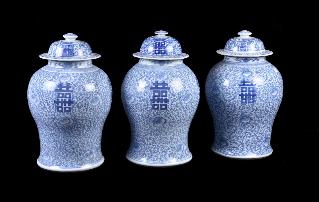 Three Chinese blue and white 'Marriage' vases and (1 of 3)
