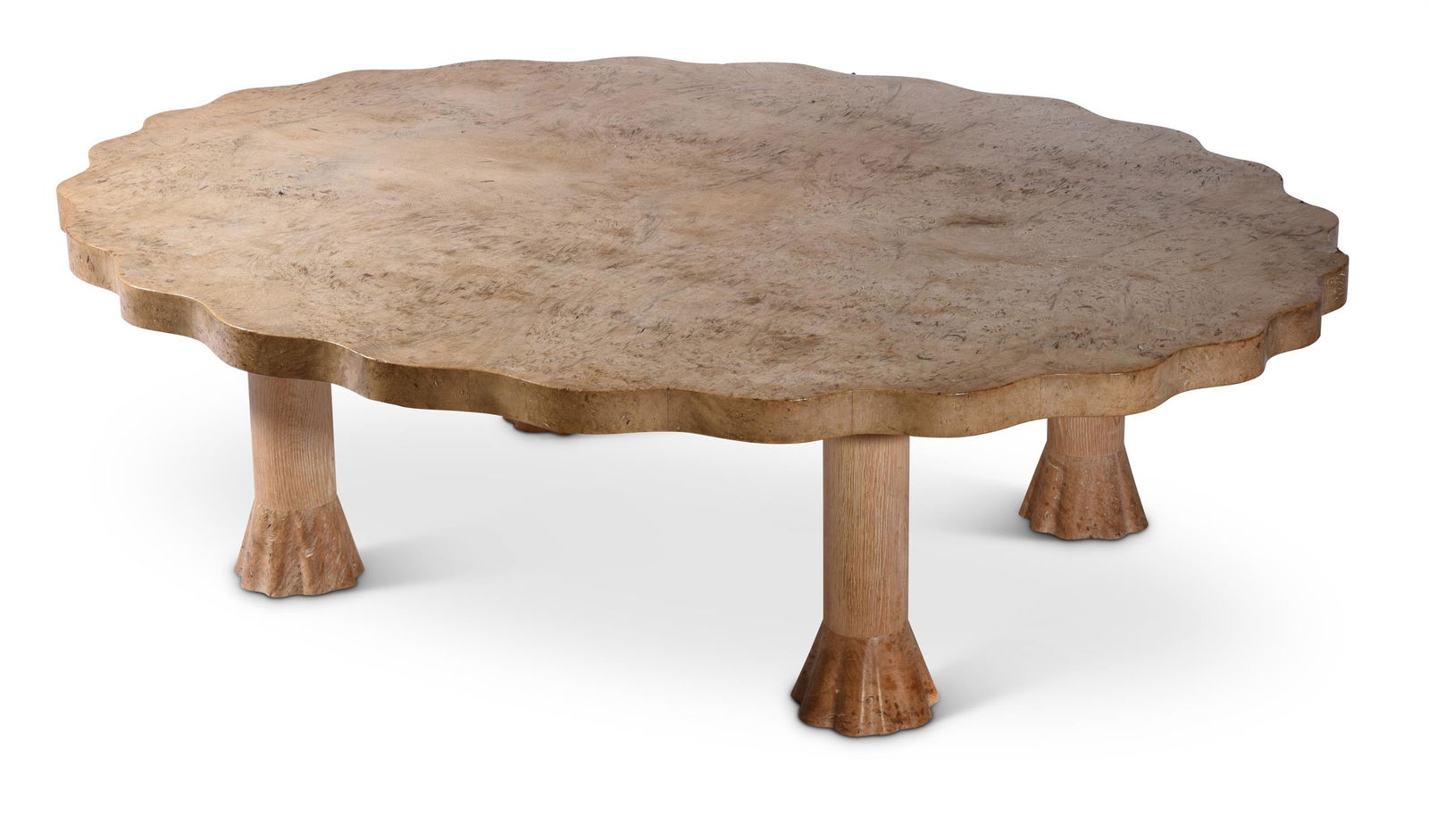 AN OAK AND BURR OAK SHAPED CIRCULAR COFFEE TABLE, BY: AN OAK AND BURR OAK SHAPED CIRCULAR COFFEE TABLE BY JOHN MAKEPEACE, OBE (B. 1939), 1984Inscribed 'Designed by John Makepeace and made in his workshop by Adrian J. Foote 1984'42cm high, 150cm wide, 120