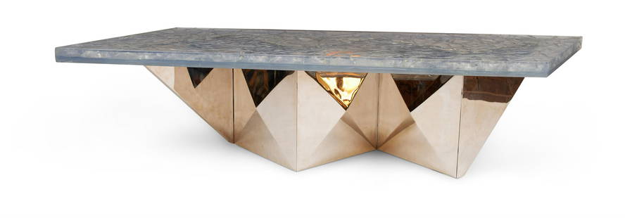 A ZIGZAG COFFEE TABLE, BY PIERRE GIRAUDON (B. 1923): A ZIGZAG COFFEE TABLEBY PIERRE GIRAUDON (B. 1923)Crackled resin top on a nickel plated zigzag base49cm high, 200cm wide, 60cm deepCatalogue Note: Pierre Giraudon was born in 1923. After a stay in Cana