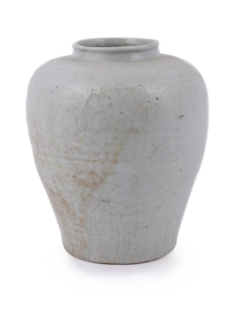 A Chinese incised qingbai 'Lotus' jar: A Chinese incised qingbai 'Lotus' jar, 16th-17th century, Ming Dynasty, freely incised with lotus foliage to the exterior, 28cm highProvenance: Private London collection明16-17世纪 &