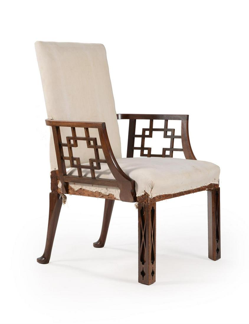 ϒ A MAHOGANY 'COCKPEN' ARMCHAIR, IN THE MANNER OF THOMAS CHIPPENDALE, 19TH CENTURY: ϒ A MAHOGANY 'COCKPEN' ARMCHAIRIN THE MANNER OF THOMAS CHIPPENDALE, 19TH CENTURY100cm high, 69cm wide, 65cm deepFor a comparable pair of chairs with the same pattern of pierced panels see, Christ