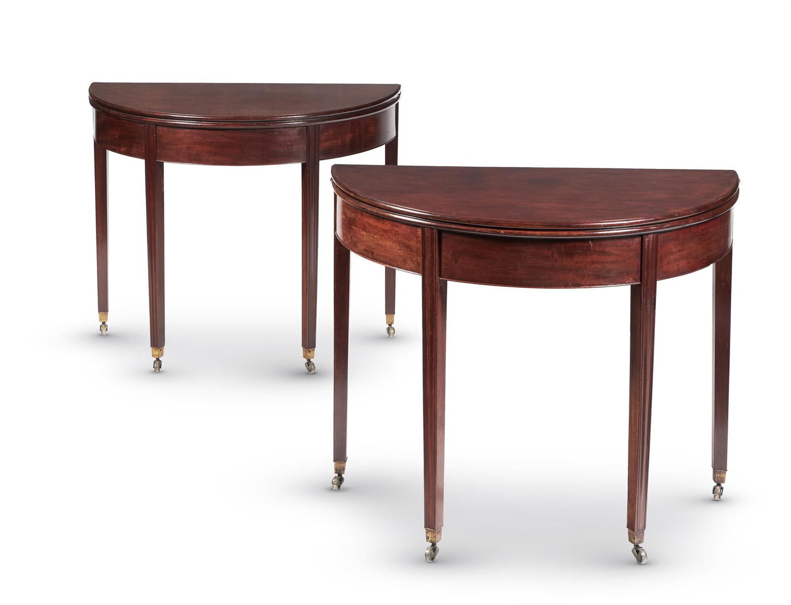 A PAIR OF GEORGE III MAHOGANY SEMI-ELLIPTICAL TEA TABLES, CIRCA 1780: A PAIR OF GEORGE III MAHOGANY SEMI-ELLIPTICAL TEA TABLESCIRCA 1780The rear legs each hinged to support the open tops72cm high, 91.5cm wide, 45.5cm deep