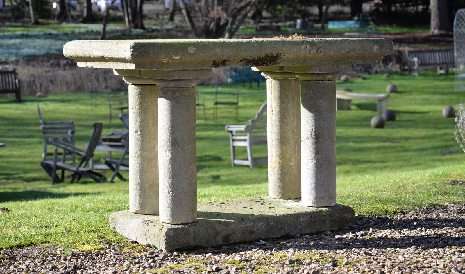 A LIMESTONE COLUMNAR GARDEN TABLE, 20TH CENTURY (1 of 3)