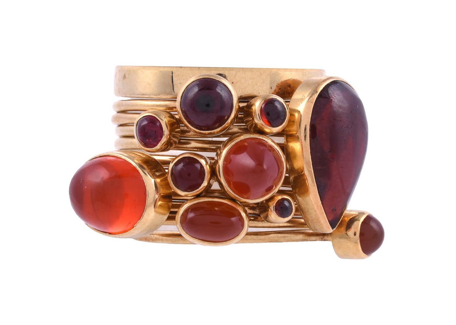 WENDY RAMSHAW CBE, AN 18 CARAT GOLD, GARNET AND FIRE OPAL ELEVEN RING STACK, LONDON 1987: WENDY RAMSHAW CBE, AN 18 CARAT GOLD, GARNET AND FIRE OPAL ELEVEN RING STACK LONDON 1987 The eleven stackable rings one a polished band, the others with various shaped cabochon fire opals and garnets i