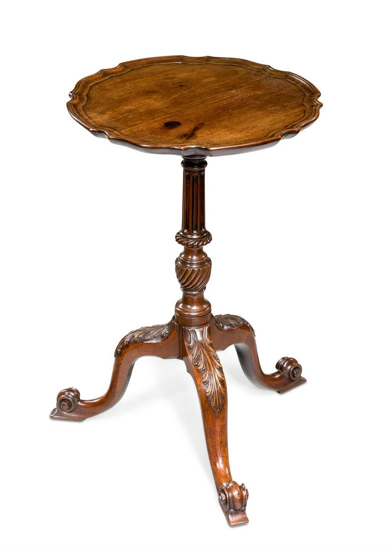 AN EARLY GEORGE III MAHOGANY CANDLE STAND, IN THE MANNER OF THOMAS CHIPPENDALE: AN EARLY GEORGE III MAHOGANY CANDLE STAND IN THE MANNER OF THOMAS CHIPPENDALE, CIRCA 1760 With 'pie crust' moulded top61cm high, the top 38cm diameterProvenance:Barnwell Manor, NorthamptonshireWindsor
