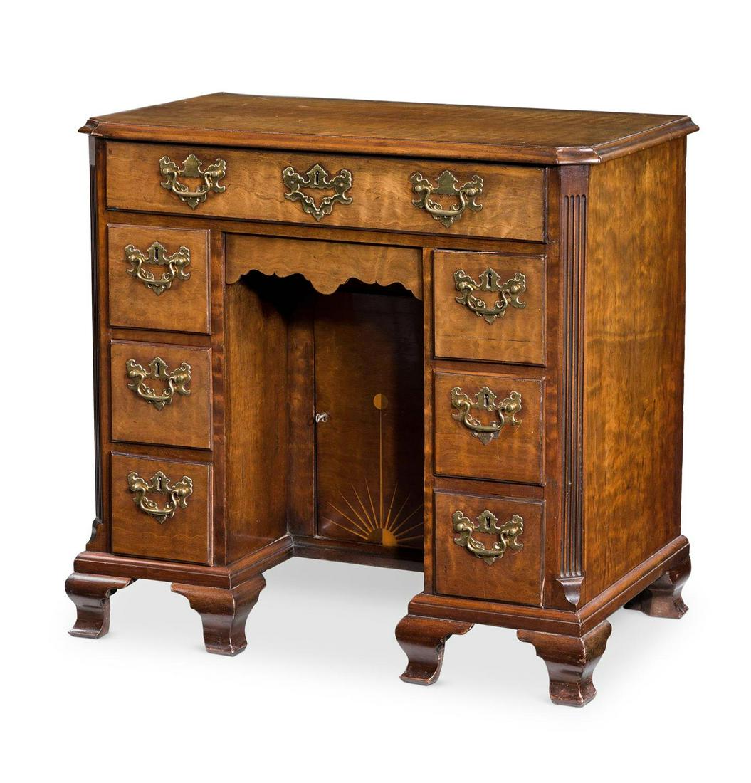 A GEORGE III 'FUSTIC' MAHOGANY KNEEHOLE DESK, CIRCA 1770: A GEORGE III 'FUSTIC' MAHOGANY KNEEHOLE DESKIN THE MANNER OF THOMAS CHIPPENDALE, CIRCA 177081.5cm high, 86cm wide, 50cm deepProvenance:Barnwell Manor, NorthamptonshireWindsor House Antiques