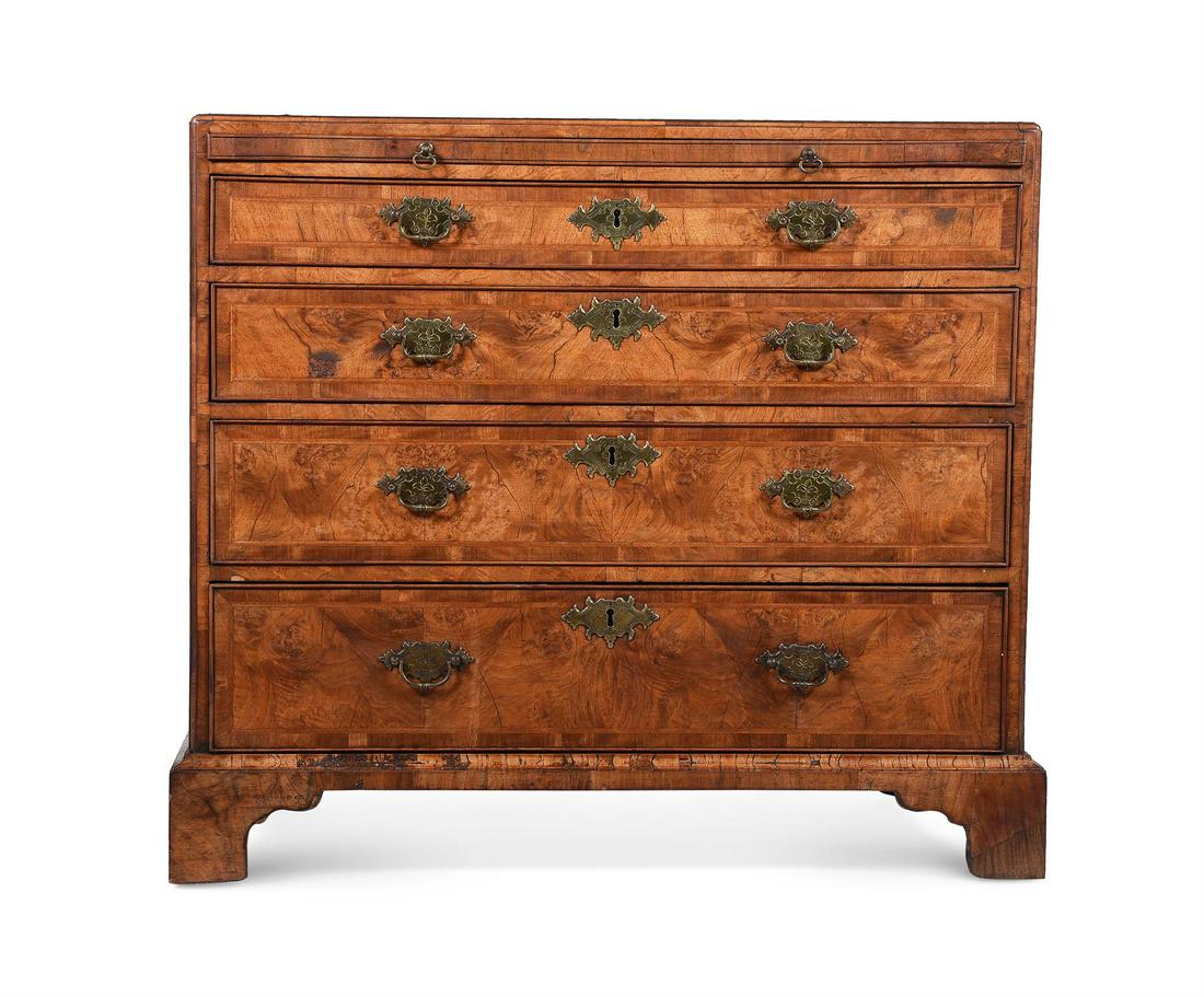 A BURR WALNUT AND FEATHERBANDED CHEST OF DRAWERS IN THE MANNER OF GILES GRENDEY (1 of 5)