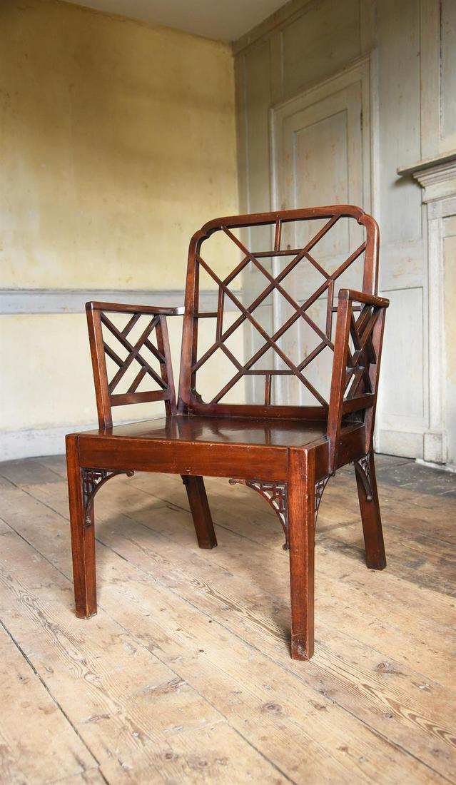 A GEORGE III MAHOGANY 'COCKPEN' ARMCHAIR, IN THE MANNER OF THOMAS CHIPPENDALE, CIRCA 1790: A GEORGE III MAHOGANY 'COCKPEN' ARMCHAIR IN THE MANNER OF THOMAS CHIPPENDALE, CIRCA 1790 96cm high, 67cm wide, 59.5cm deep overall Provenance: Property from the Phillip Lucas Collection, Spitalfields