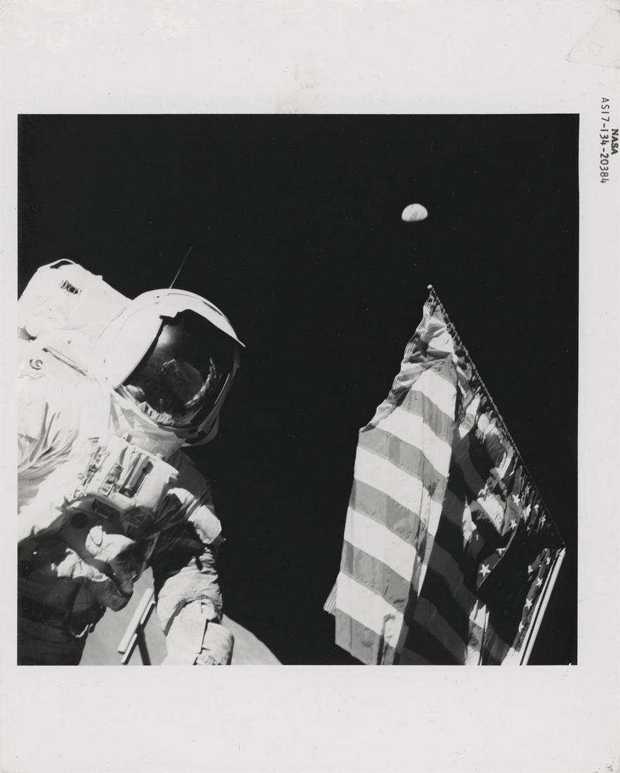 Harrison Schmitt with the Earth above the American flag Apollo 17, 7-19 December 1972, EVA 1 (1 of 3)