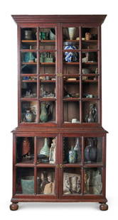 A WILLIAM & MARY OAK GLAZED 'PEPYS' BOOKCASE OR CABINET LATE 17TH CENTURY: A WILLIAM & MARY OAK GLAZED 'PEPYS' BOOKCASE OR CABINET LATE 17TH CENTURY The interior with adjustable shelves 213cm high, 107.5cm wide, 40cm deep Literature: O.F. Morshead, 'The Colleges of Oxford