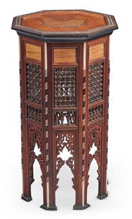 Y A WALNUT, MOTHER OF PEARL AND BONE INLAID OCTAGONAL TABLE, SYRIAN, MID 20TH CENTURY: Y A WALNUT, MOTHER OF PEARL AND BONE INLAID OCTAGONAL TABLE SYRIAN, MID 20TH CENTURY The recessed top centred with a star, the sides with pierced and bobbin turned panels 75cm high, 45.5cm wide ϒ