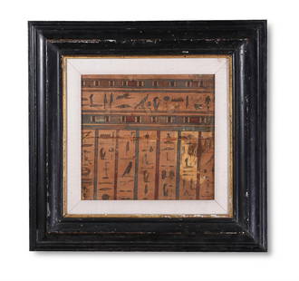 AN EGYPTIAN WOOD POLYCHROME PAINTED SARCOPHAGUS PANEL, CIRCA 400-30 B.C.: AN EGYPTIAN WOOD POLYCHROME PAINTED SARCOPHAGUS PANEL LATE PERIOD - PTOLEMAIC, CIRCA 400-30 B.C.Painted with one line and seven columns of inscription, the text containing recitations of Horus on beha
