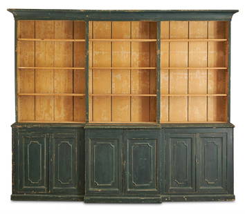 A GEORGE III INDIGO GREEN PAINTED PINE BREAKFRONT BOOKCASE, EARLY 19TH CENTURY: A GEORGE III INDIGO GREEN PAINTED PINE BREAKFRONT BOOKCASE EARLY 19TH CENTURY The panelled doors enclosing shelves218cm high, 262cm wide, 33cm deep