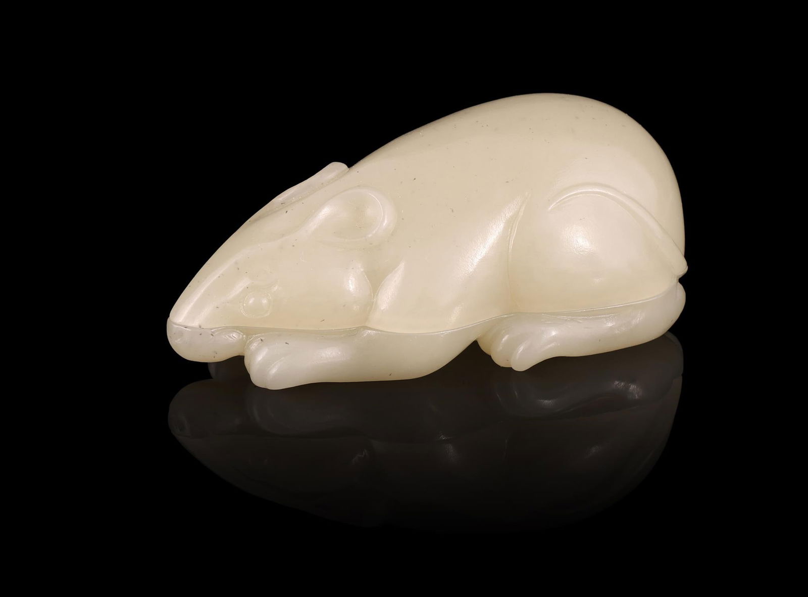 A Chinese pale celadon jade 'Squirrel' box and cover (1 of 2)