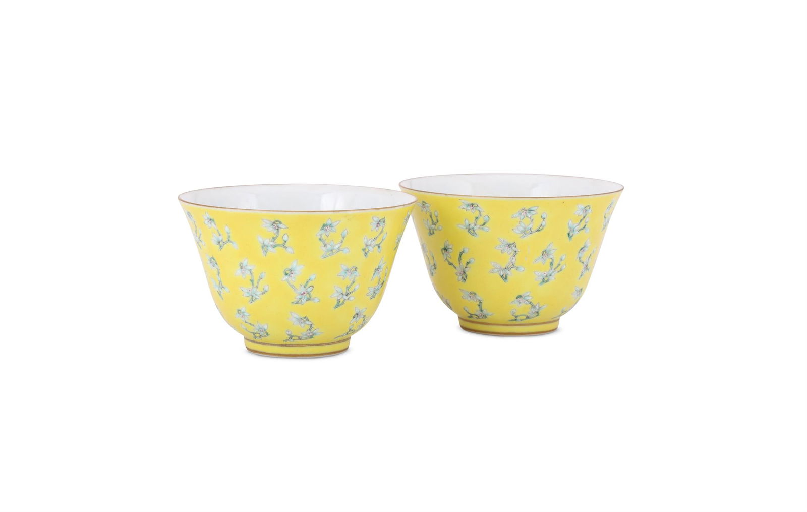 A pair of Chinese yellow glazed cups (1 of 2)