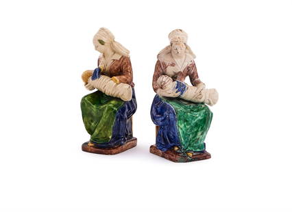 ‡ A PAIR OF FRENCH EARTHENWARE FIGURES OF 'LA NOURRICE', FIRST HALF 17TH CENTURY,: ‡ A PAIR OF FRENCH EARTHENWARE FIGURES OF 'LA NOURRICE' FIRST HALF 17TH CENTURY, PROBABLY FONTAINEBLEAU, ATELIER OF CLAUDE BERTHELEMY, OR AVON After a model by Guillaume Dupré 21.5 and 22cm