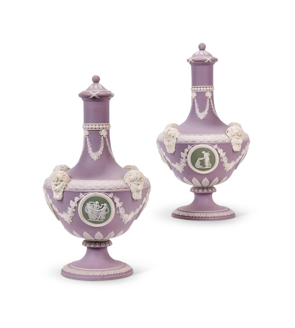 A PAIR OF WEDGWOOD LILAC-DIP JASPER TRI-COLOUR CLASSICAL FLASKS AND COVERS, LATE 19TH CENTURY: A PAIR OF WEDGWOOD LILAC-DIP JASPER TRI-COLOUR CLASSICAL FLASKS AND COVERS LATE 19TH CENTURY Each applied with four sage green ground medallions sprigged in white with classical figures and suspending