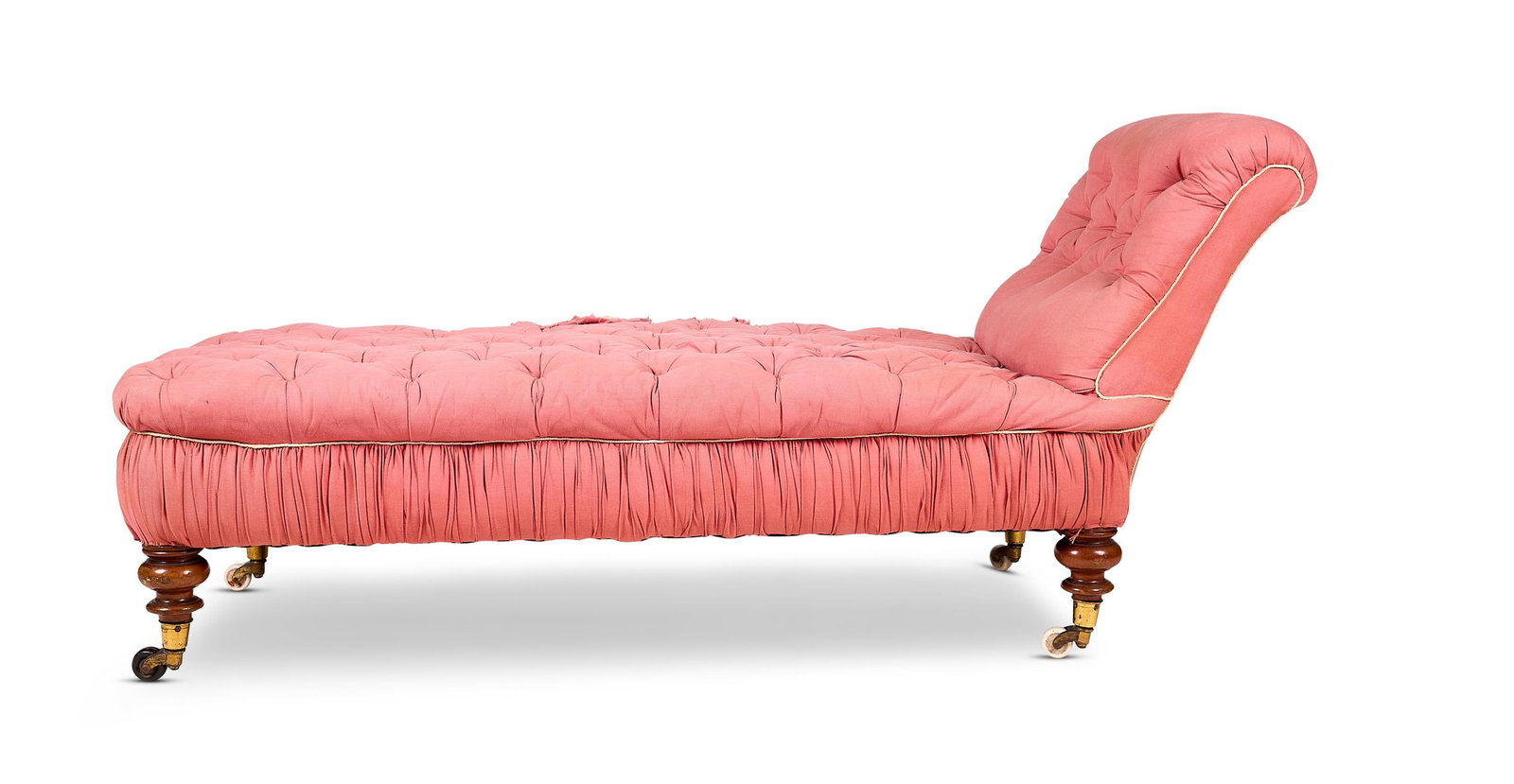 A VICTORIAN MAHOGANY FRAMED BUTTONED AND UPHOLSTERED DAYBED OR CHAISE LONGUE, CIRCA 1870: A VICTORIAN MAHOGANY FRAMED BUTTONED AND UPHOLSTERED DAYBED OR CHAISE LONGUECIRCA 1870 On turned supports 79cm high, 176cm long, 65cm deep