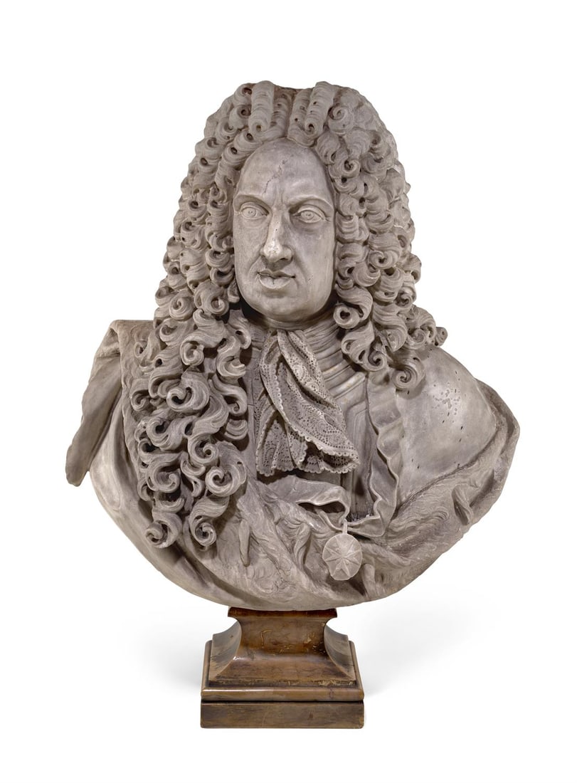 AFTER GIOVANNI FOGGINI & BARTOLOMEO CENNINI- A MARBLE BUST OF GIAN GASTONE DE'MEDICI: AFTER GIOVANNI BATTISTA FOGGINI AND BARTOLOMEO CENNINI- A MARBLE BUST OF GIAN GASTONE DE'MEDICI (1671-1737) EARLY 18TH CENTURY On a Siena marble socle 100cm high overall, base 25.5cm wide Literature: