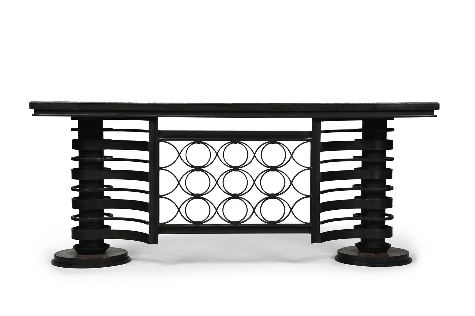 IN THE MANNER OF RAYMOND SUBES; A PAIR OF ART DECO CONSOLES; CIRCA 1930: IN THE MANNER OF RAYMOND SUBESA PAIR OF ART DECO CONSOLES; CIRCA 1930Patinated wrought iron, openwork design, with black veined marble inset tops.76cm high, 180cm wide, 50cm deep Please note that we w