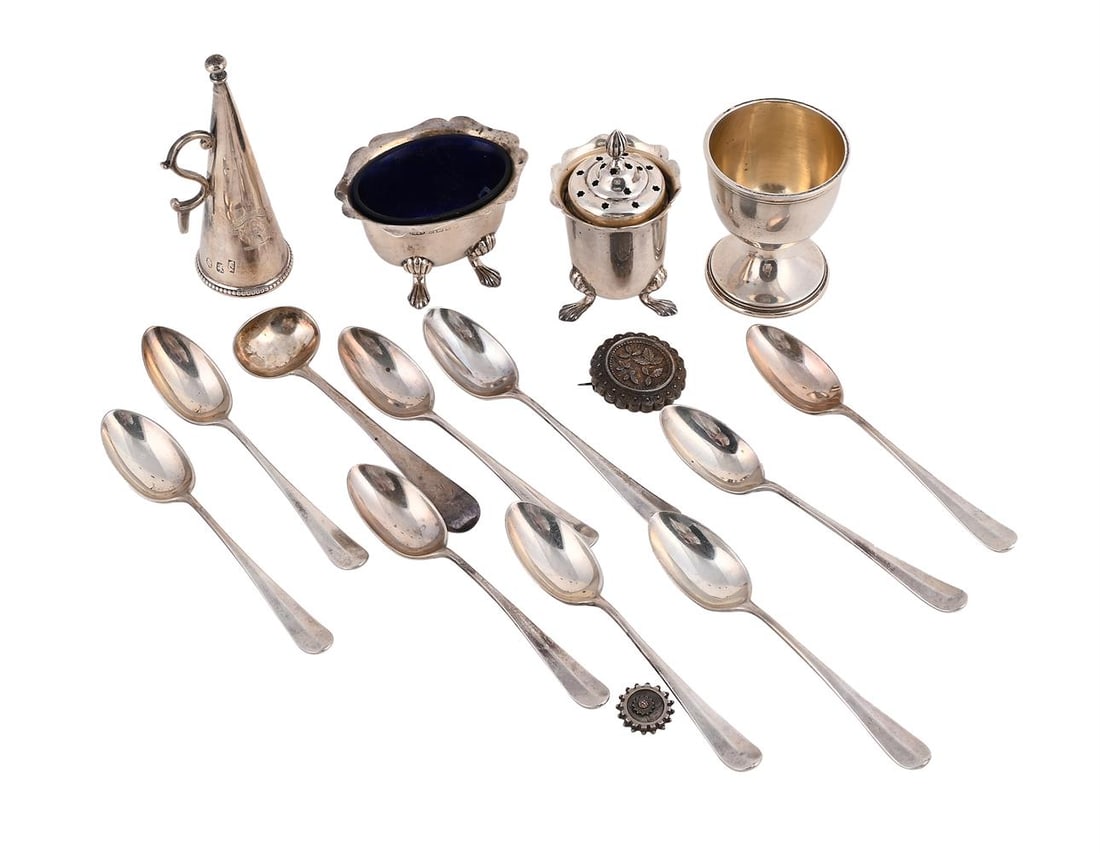 A SILVER SHAPED CIRCULAR SALVER: A SILVER SHAPED CIRCULAR SALVER MAPPIN