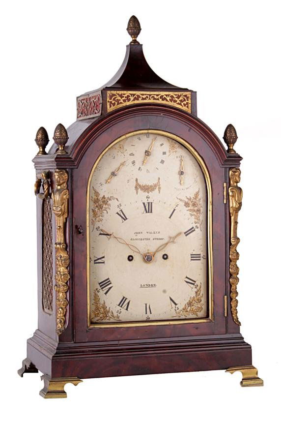 A George III brass mounted mahogany table clock wi: A George III brass mounted mahogany table clock with alarm for the Iberian market John Walker, London, circa 1800 The five pillar twin fusee bell striking movement with original anchor esca
