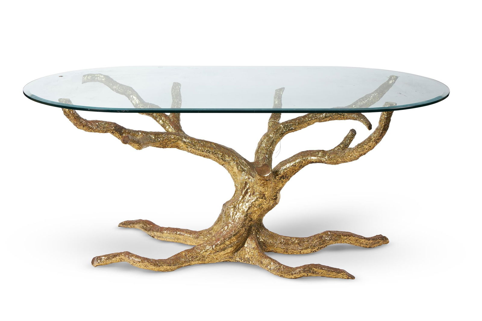 JACQUES DUVAL-BRASSEUR (FRENCH, 1934-2021), A GILT METAL 'TREE' TABLE; CIRCA 1970: JACQUES DUVAL-BRASSEUR (FRENCH, 1934-2021)A GILT METAL 'TREE' TABLE; CIRCA 1970 Original glass top Faint 'JDBrasseur' signature to underside of foot74cm high,180cm wide, 100cm deep