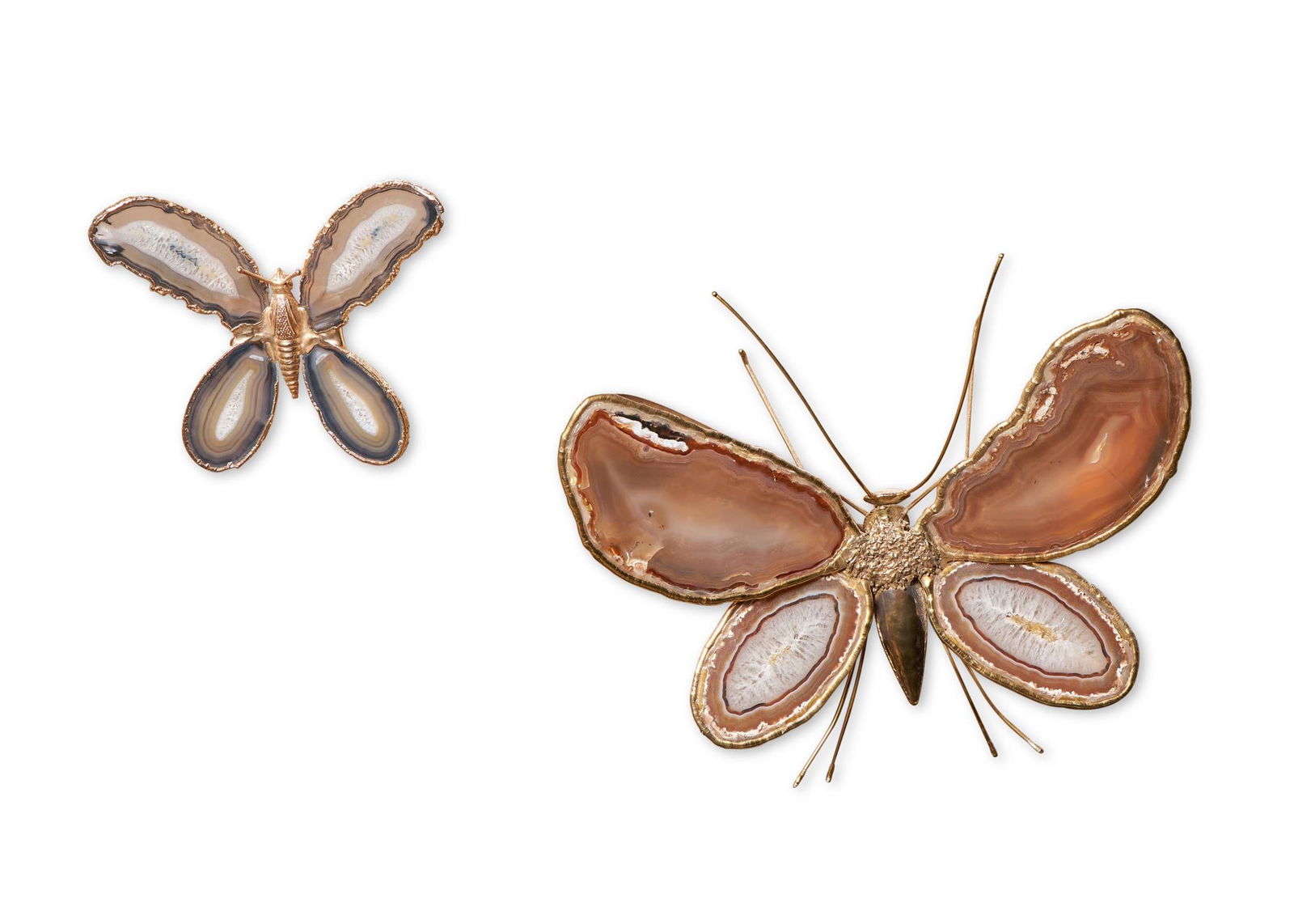 ATTRIBUTED TO JACQUES DUVAL-BRASSEUR; A GILT METAL AND AGATE BUTTERFLY WALL LIGHT; 20TH CENTURY: JACQUES DUVAL-BRASSEUR (FRENCH, 1934-2021), ATTRIBUTEDA GILT METAL AND AGATE 'BUTTERFLY' WALL LIGHT; SECOND HALF 20TH CENTURY With burnished tail47cm x 40cm Together with another smaller Butterfly