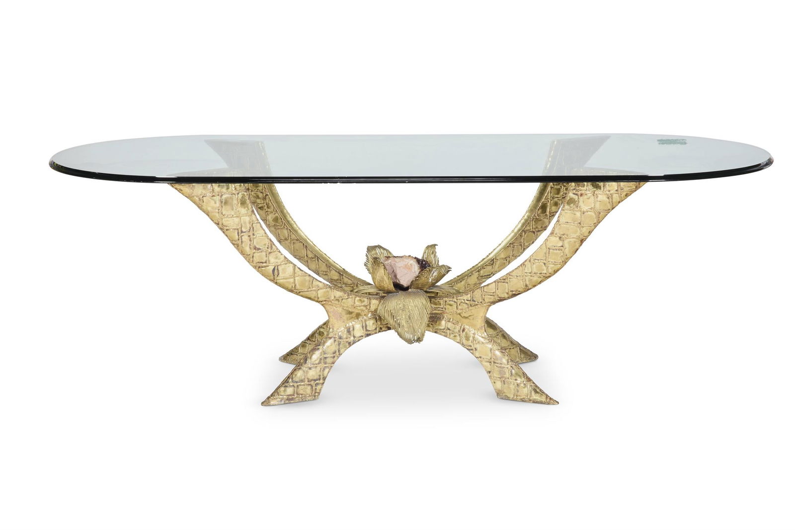 HENRI FERNANDEZ (B.1946-), FOR JACQUES DUVAL BRASSEUR (FRENCH, 1934-2021): HENRI FERNANDEZ (B.1946-) FOR JACQUES DUVAL BRASSEUR (FRENCH, 1934-2021)A GILT METAL AND QUARTZ SPECIMEN TABLE; SECOND HALF 20TH CENTURYWith glass table topSignature to the base foot 'JDBrasser'72.5cm