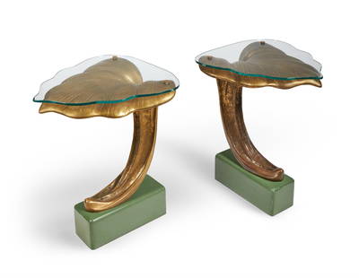 A PAIR OF ITALIAN BRONZE LEAF CONSOLE TABLES; SECOND HALF 20TH CENTURY: A PAIR OF ITALIAN BRONZE LEAF CONSOLE TABLESSECOND HALF 20TH CENTURYWith leaf shaped glass tops86cm high, 70cm wide, 67.5cm deep