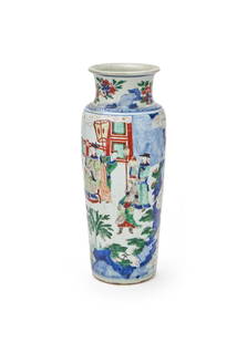 A Chinese wucai 'Birthday celebration' sleeve vase: A Chinese wucai 'Birthday celebration' sleeve vase, Transitional period, the cylindrical body rising from a flat base to a short waisted neck and everted rim, painted and enamelled around the exterior