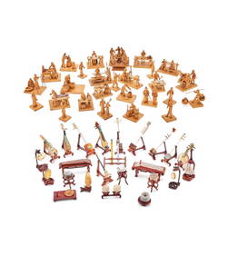 A group of twenty-seven Chinese boxwood carvings of street traders and figures (1 of 3)