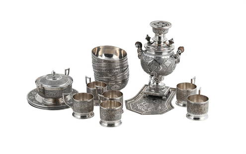 A PERSIAN SILVER COLOURED TEA SET: A PERSIAN SILVER COLOURED TEA SET 84 ST