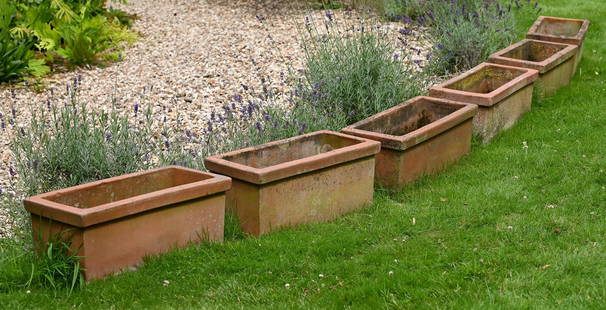 A SET OF SIX RECTANGULAR TERRACOTTA PLANTERS, MODERN: A SET OF SIX RECTANGULAR TERRACOTTA PLANTERS