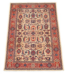 A HANDWOVEN CARPET: A HANDWOVEN CARPET IN HERIZ STYLE