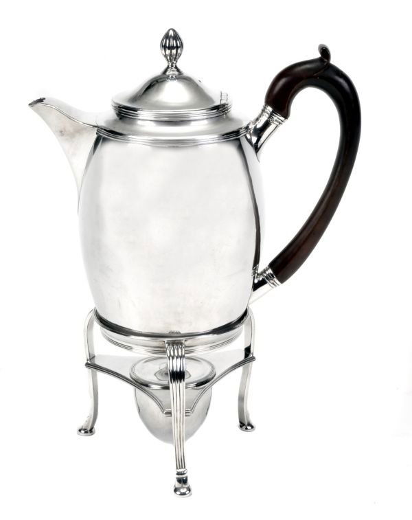 A George III silver swollen circular coffee biggin: A George III silver swollen circular coffee biggin by Robert and Samuel Hennell, London 1802, with a lobed finial to the slightly domed cover, a wooden loop handle and with reeded borders, engraved wi