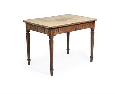 AN OAK WRITING TABLE, FRENCH, 19TH CENTURY AND LATER: AN OAK WRITING TABLEFRENCH, 19TH CENTURY With later leather writing surface above a diamond carved frieze and on fluted square section legs75cm high, 104cm wide, 71cm deep Provenance: Purchased from H