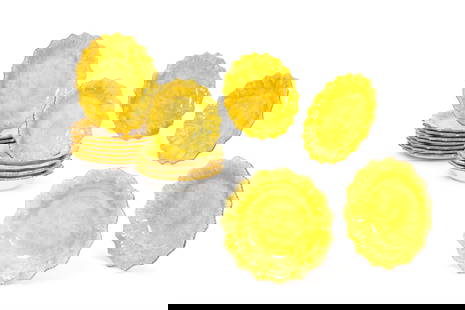 TEN YELLOW GLAZED POTTERY PLATES AND SEVEN MATCHING BOWLS, BY ESTE CERAMICHE PORCELLANE: TEN YELLOW GLAZED POTTERY PLATES AND SEVEN MATCHING BOWLSBY ESTE CERAMICHE PORCELLANE, ITALY, MODERNThe plates 25cm diameter