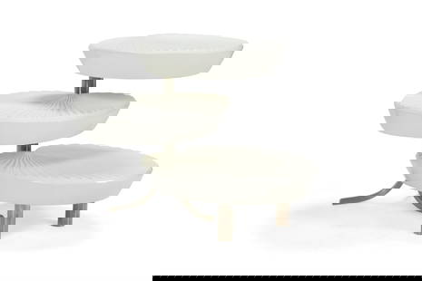 A WHITE LACQUER AND STEEL THREE-TIER ROTATING SIDE TABLE, LATE 20TH CENTURY: A WHITE LACQUER AND STEEL THREE-TIER ROTATING SIDE TABLE LATE 20TH CENTURY, IN THE MANNER OF GABRIELLA CRESPI (1922 -2017)Each tier in the form of a palm leaf 60.5cm high, approximately 80cm long