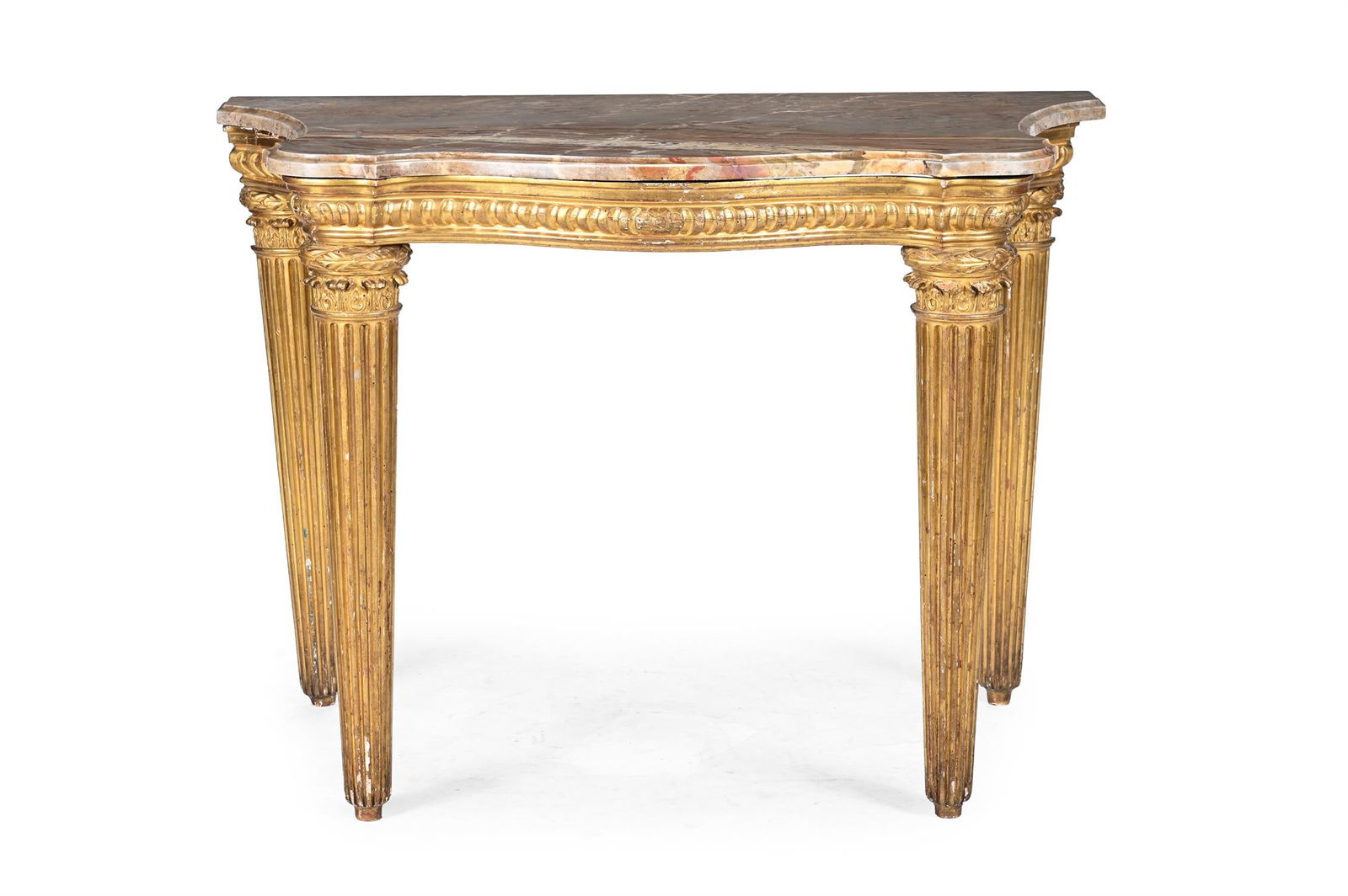 AN ITALIAN CARVED GILTWOOD SERPENTINE CONSOLE TABLE, LATE 18TH OR EARLY 19TH CENTURY: AN ITALIAN CARVED GILTWOOD SERPENTINE CONSOLE TABLELATE 18TH OR EARLY 19TH CENTURYWith a shaped marble top88.5cm high, 124cm wide, 71.5cm deep