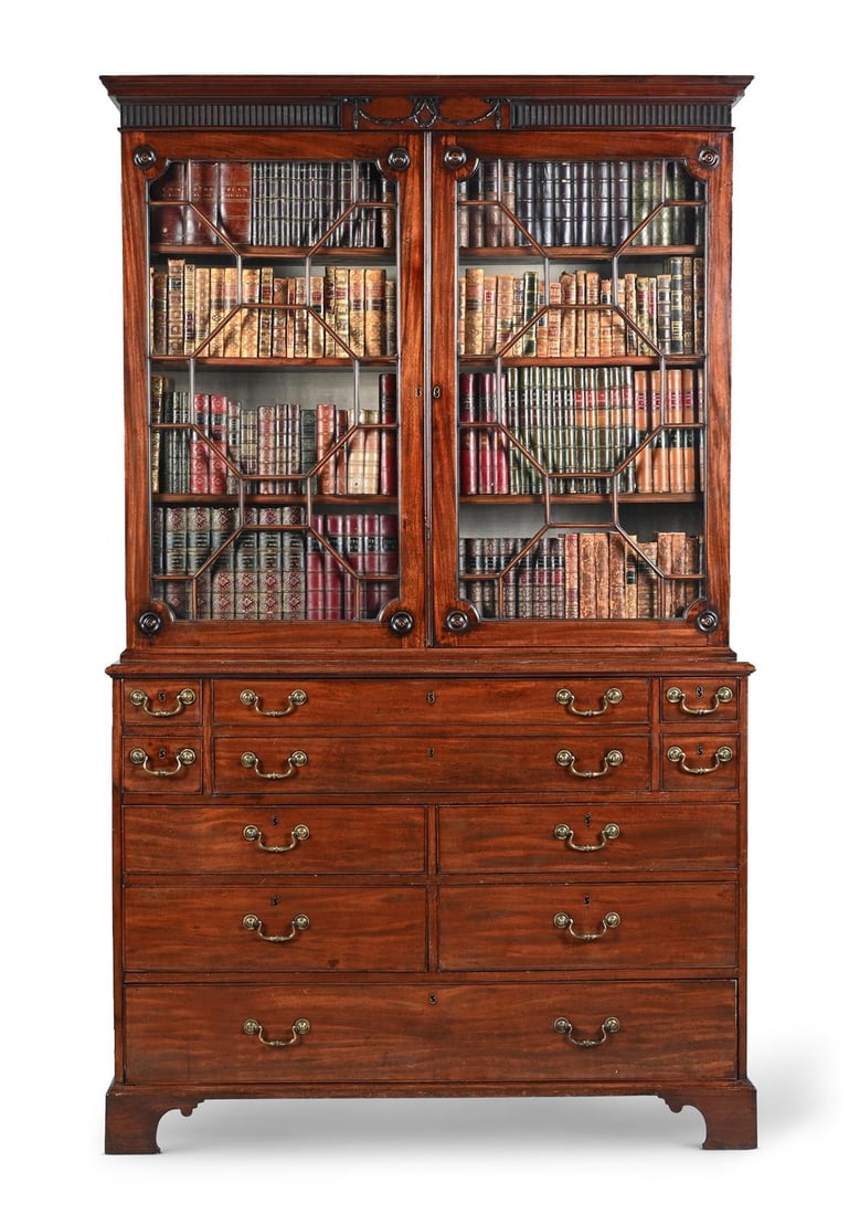 A GEORGE III MAHOGANY SECRETAIRE BOOKCASE, ATTRIBUTED TO THOMAS CHIPPENDALE, CIRCA 1770/80: A FINE GEORGE III MAHOGANY SECRETAIRE BOOKCASE ATTRIBUTED TO THOMAS CHIPPENDALE, CIRCA 1775With glazed doors and graduated drawers in the lower part, gilt-brass swan-neck handles, with S-pattern