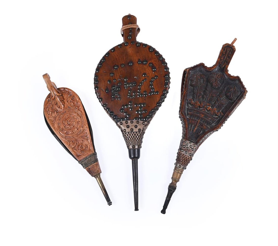 A SET OF THREE CARVED WOOD AND LEATHER BELLOWS, 19TH CENTURY: THREE SETS OF VARIOUS CARVED WOOD AND LEATHER BELLOWS
