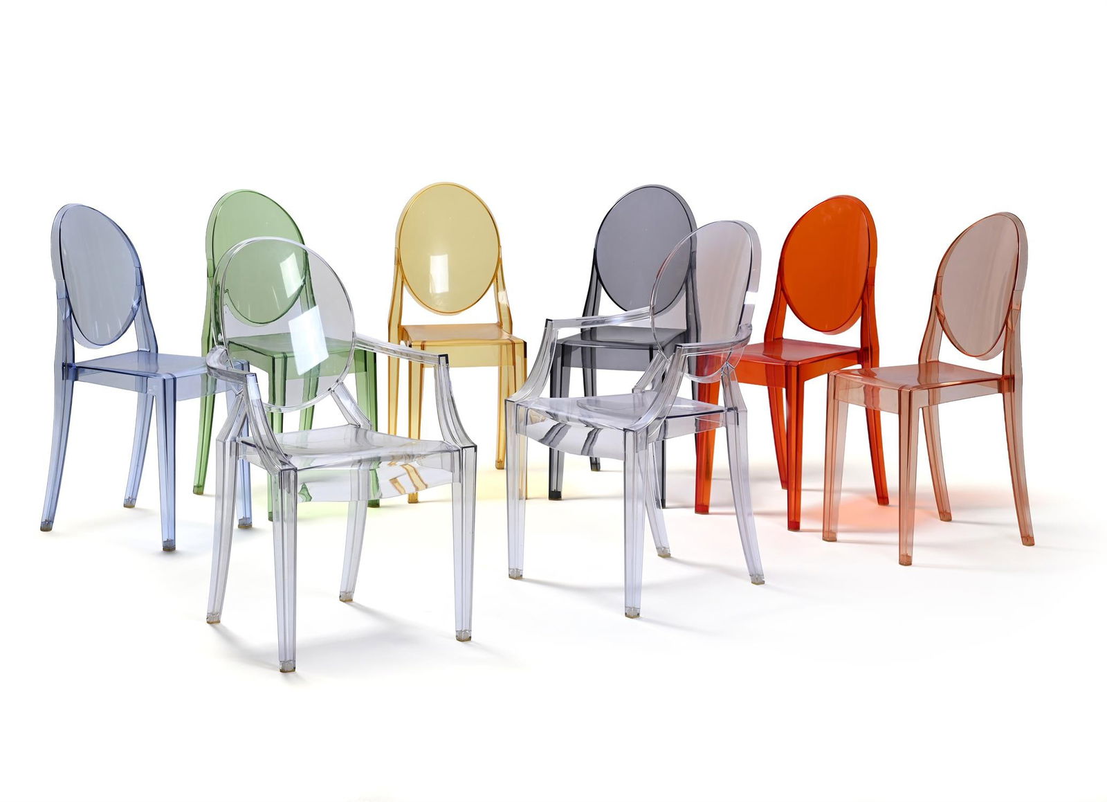 PHILIPPE STARCK (FRENCH, B.1949), EIGHT 'VICTORIA GHOST' CHAIRS; DESIGNED 2002: PHILIPPE STARCK (FRENCH, B.1949)EIGHT 'VICTORIA GHOST' CHAIRS; DESIGNED 2002Two clear (crystal) carvers and six multi-coloured dining chairs (grey, yellow, red, orange, blue and green)Designed for and