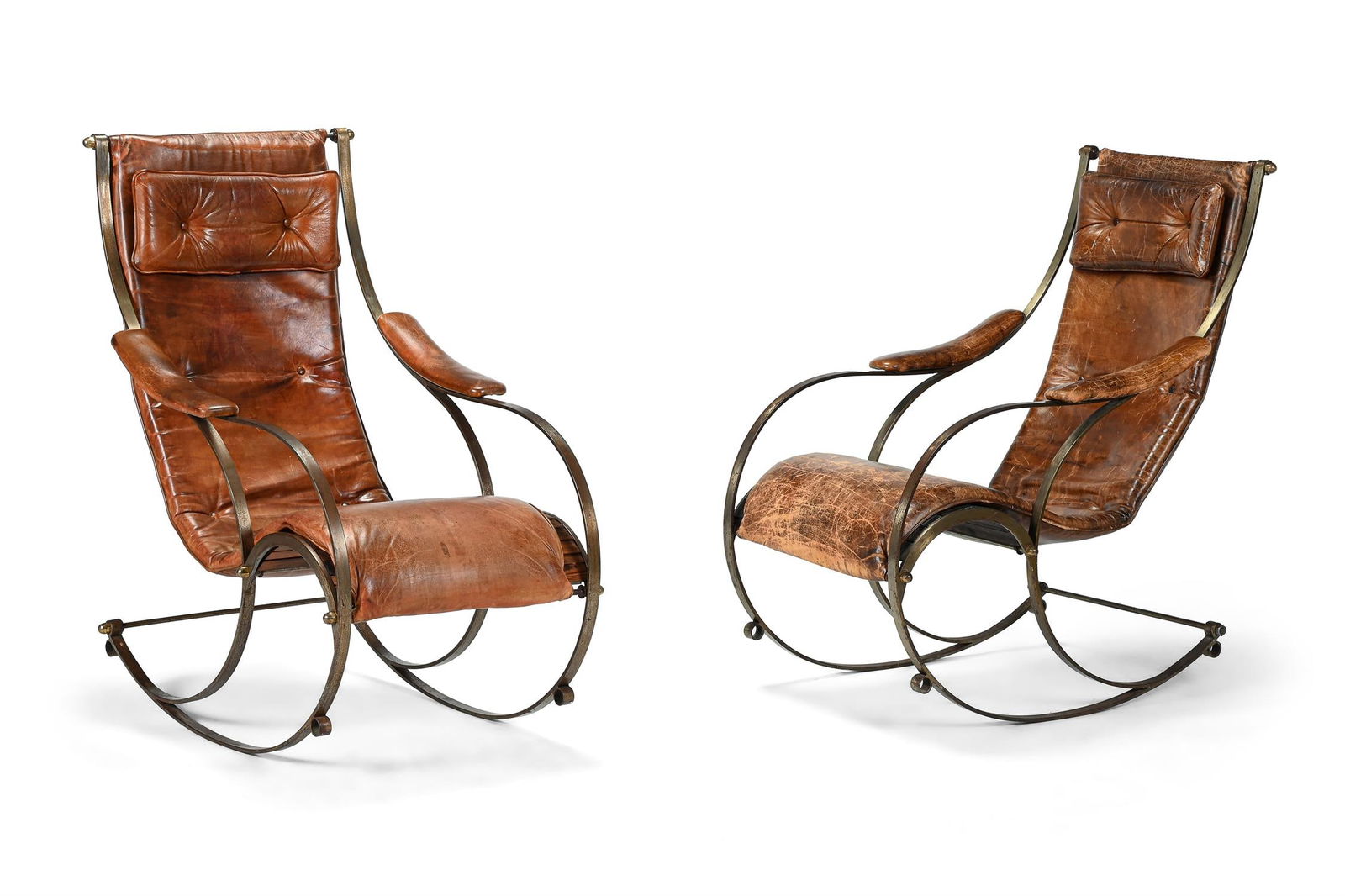 A PAIR OF ROCKING CHAIRS; CIRCA 1900 (1 of 2)