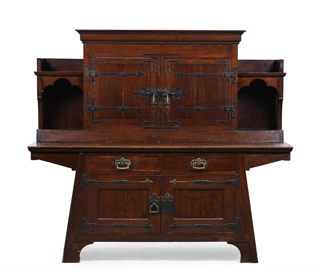KARL SCHMIDT-HELLERAU (1873-1948), ATTRIBUTED; A SIDEBOARD; LATE 19TH CENTURY: KARL SCHMIDT-HELLERAU (1873-1948): ATTRIBUTEDA LARGE SIDEBOARD; LATE 19TH CENTURYOak, metal hinges/handlesStamped to lock fixing of drawers 'F.O. SCHMIDT WIEN'176cm high, 200cm wide, 71.5cm deepProven