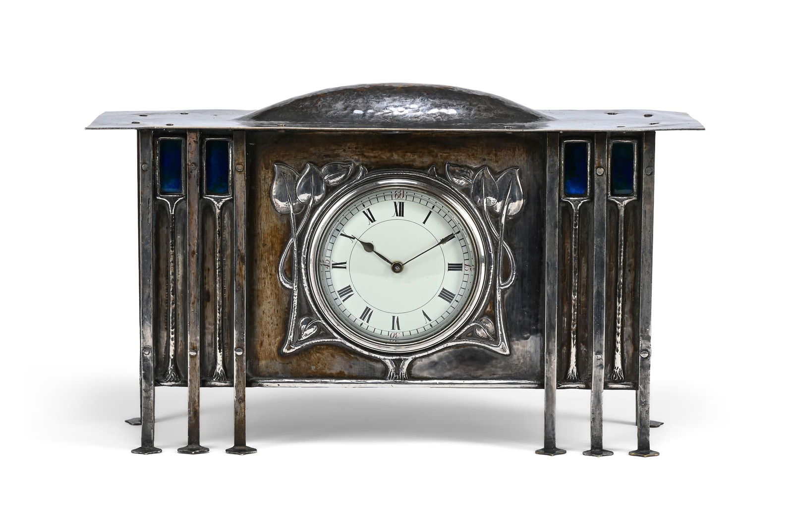 GEORGE WALTON (BRITISH, 1867-1933), ATTRIBUTED; MANTEL TIMEPIECE, CIRCA 1900: GEORGE WALTON (BRITISH, 1867-1933), ATTRIBUTEDMANTEL TIMEPIECE; CIRCA 1900Pewter, enamelLikely made by Goodyers, LondonMovement stamped 'R & CO MADE/ MADE IN PARIS'18cm high, 33.5cm wide, 11cm deep