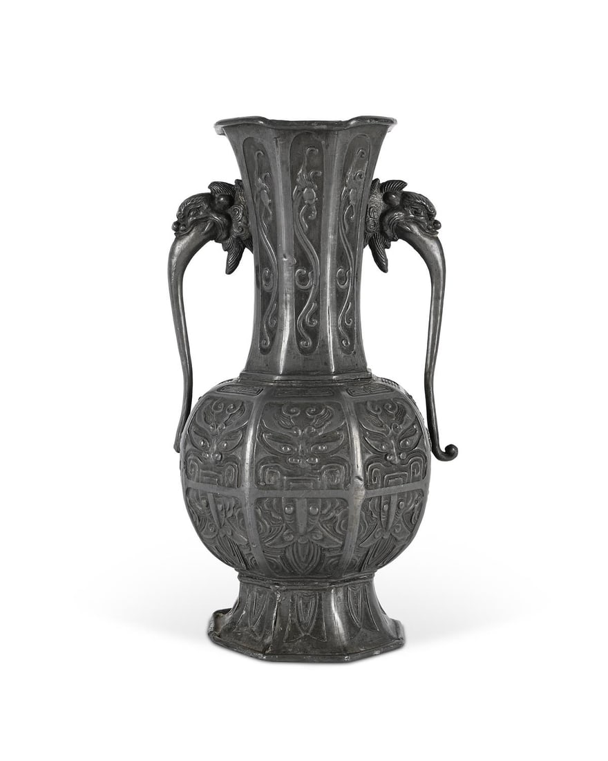 A Chinese twin handled pewter vase