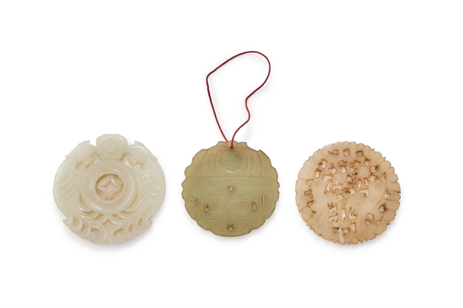 A Chinese white jade 'Double phoenix' pendant (1 of 2)